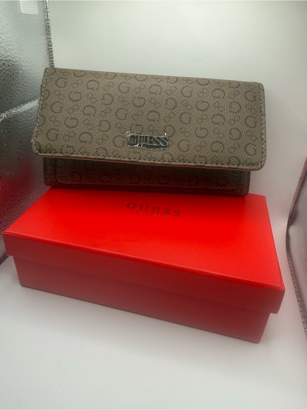 GUESS Brown Logo-Print Continental Wallet with Silver Plaque